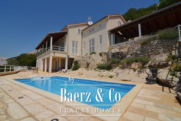 photo 1 Krk, Stara Baška, exclusive villa embedded in a rock NKP 450 m2, panoramic sea view