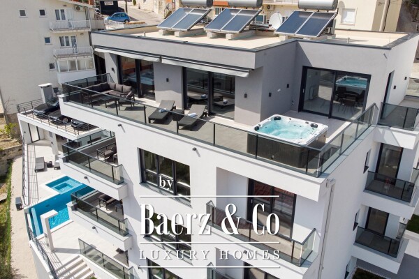 photo 1 Omiš, elegant villa with three apartments and open sea view