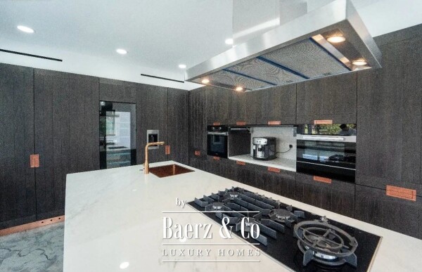 photo 3 Live Steps from the Sea: Brand-New Designer Mansion with Pool, Gym & Smart Home